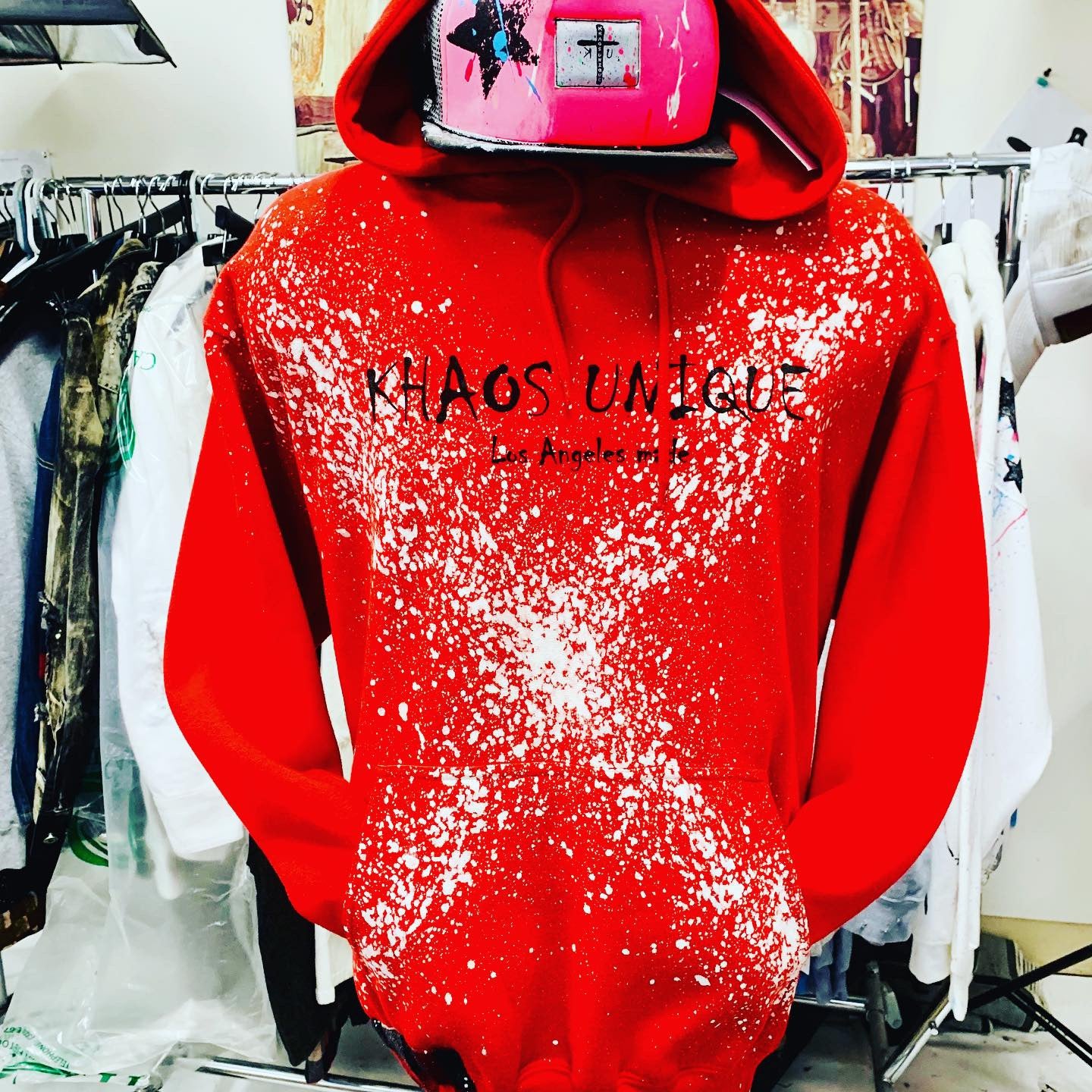 Createdby custom painted NFC tag painted X red hoodie.  size LG